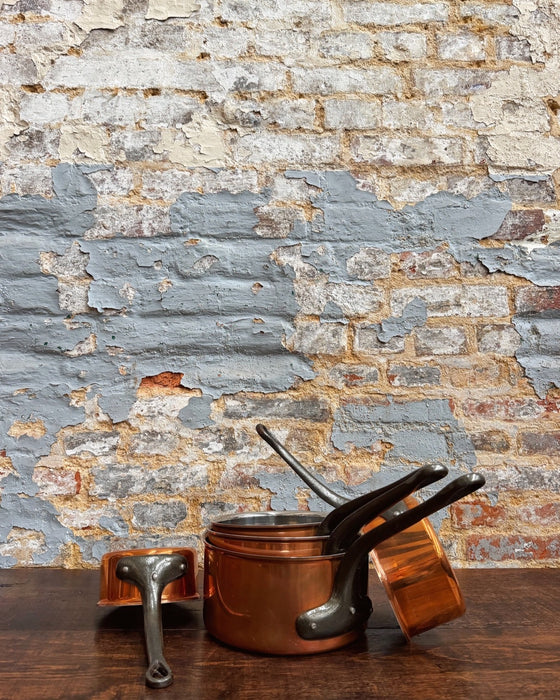 Set of copper pans