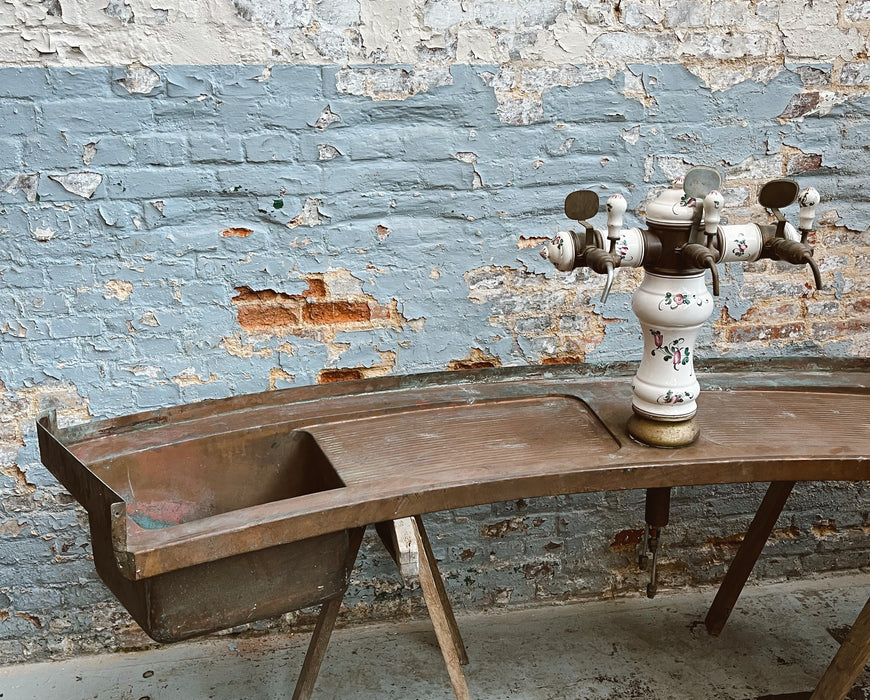 Old copper sink