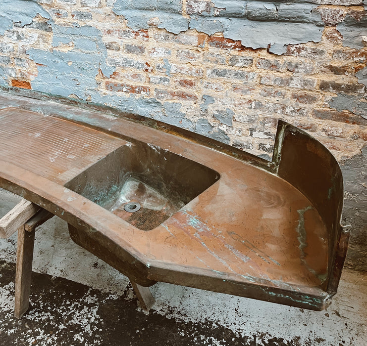 Old copper sink