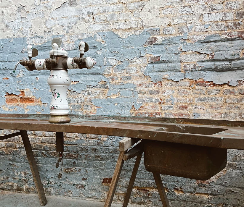 Old copper sink