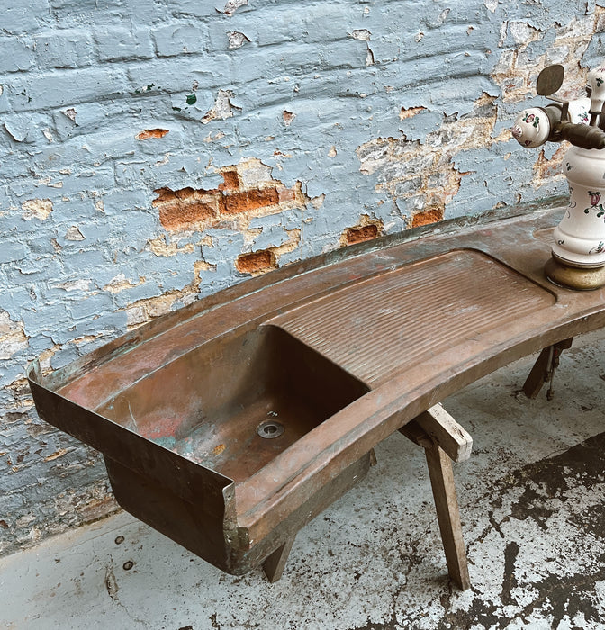 Old copper sink