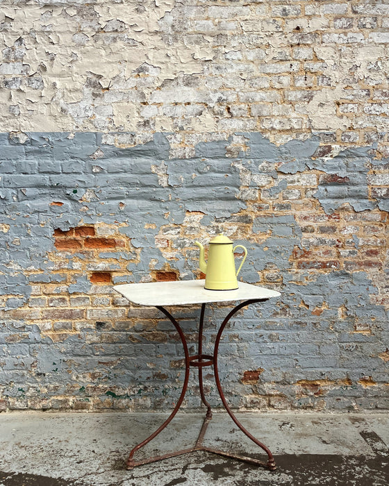 Wrought iron pedestal table