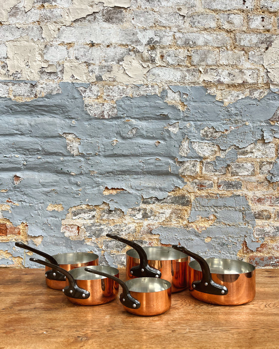 Set of copper pans