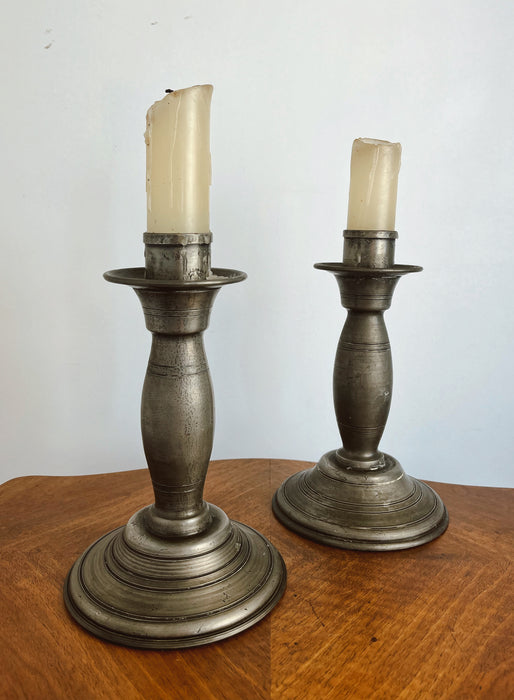 Pair of pewter candlesticks